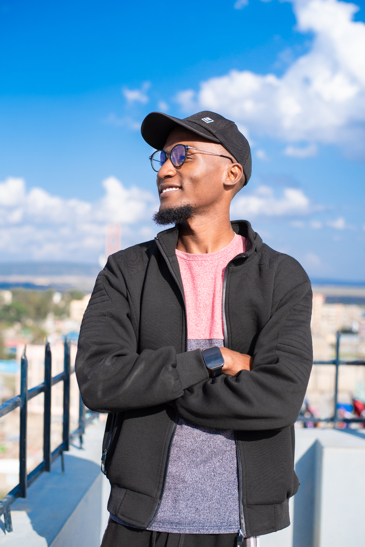 Simon Ngoma overlooking the city — strategy and vision